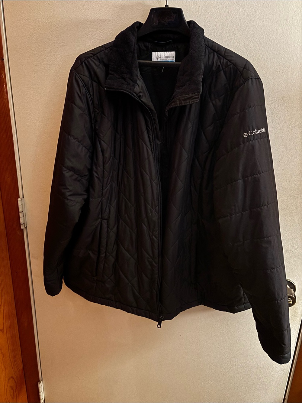 Columbia Black Quilted Puffer Jacket. Tag missing. Measures 26” PTP and 28” long